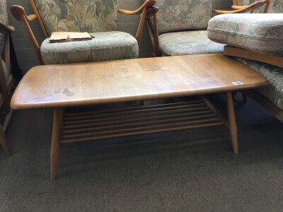 An Ercol occasional table, the turned legs united by an undertier