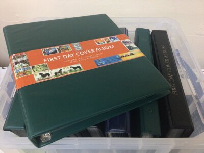 A box containing eight albums of first day covers and presentation packs (8)