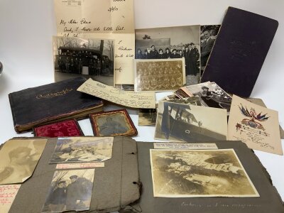 A collection of WW1 and later ephemera and personal documents together with a collection of postcards and photographs. (Included a WW1 album of photos from a military fierce hospital).