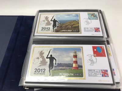 A collection of 9 assorted stamp albums
