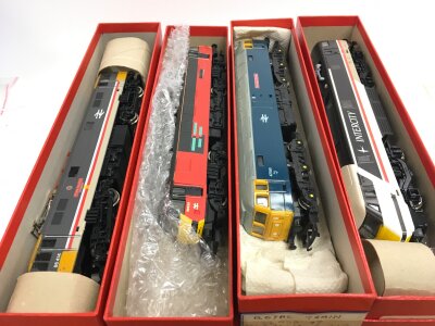 Four boxed Hornby trains