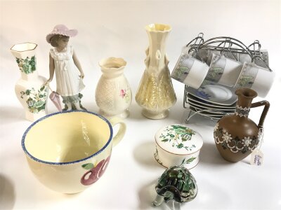 A box containing three pieces of Poole, two crown staffs, Doulton 1880 jug, coffee set silver edged in chrome carrier,  Dunhill tobacco jar , face mask italian, three pieces of Belleek , nao girl, noritake, Doncaster cup and saucer, two Limoges candlesticks