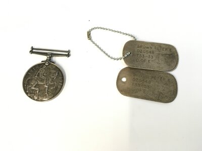 A world war 1 medal awarded to PTE S S Hadler A.S.C and a pair of dog tags. NO RESERVE