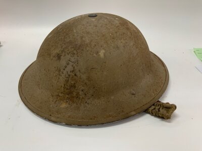 A WW2 British MKII steel helmet.