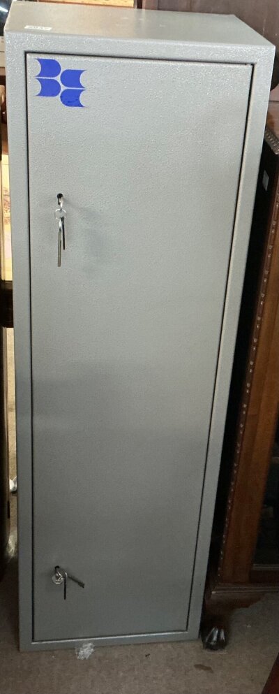 a six/eight capacity gun cabinet , double lock keys to both
