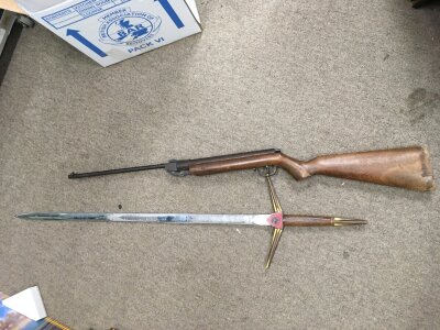 An air gun and a sword.