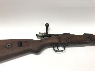 1937 dated German Kar 98k bolt-action rifle, likely featuring the "5/42" factory code assigned to Mauser in Oberndorf. The receiver is marked with "Mod 98" and the year of manufacture, 1937. .410.
44.5 inches overall length.

Please note that a shotgun license is required to purchase this lot. Viewing and collection is by appointment only.