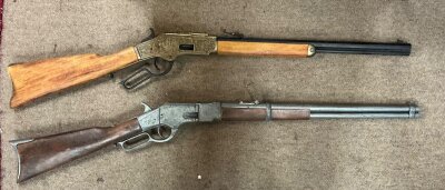 two non firing replica Winchester rifles