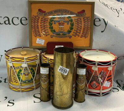 A collection of small sell cases, Middlesex key ice buckets and a framed Middlesex regiment