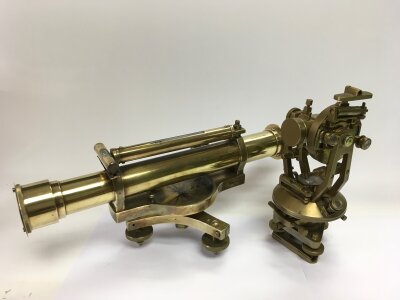 A brass theodolite, some damage, and one other brass scientific instrument (2).