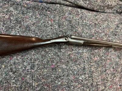 A 12 bore side by side shotgun by Adams. 28.5 inch barrels and 45.5 overall.
Black powder only.
Serial 13739

Please note that a shotgun license is required to purchase this lot. Viewing and collection is by appointment only.