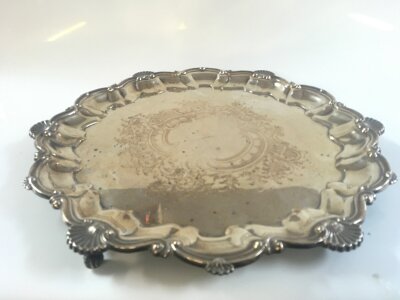 A heavy vintage silver plated Salver on three feet, 37cm wide