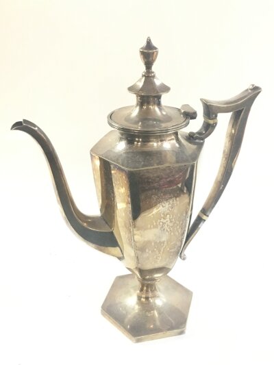 An unusual shaped silver plated coffee pot possibly Victorian, 25cm tall