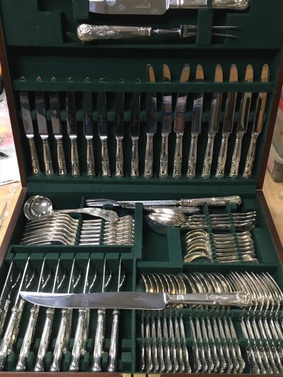 A canteen of Harrods cutlery including knives ,spoons ,forks etc
