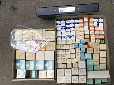 Two boxes of vintage valves with a vintage cv register of electronic valves