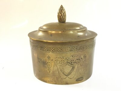 A Victorian brass tea caddy. 16cm wide 17cm tall