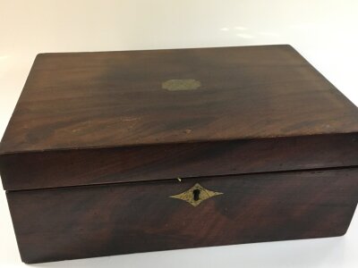 A Victorian mahogany box with lift out section and key. 28cm wide 20cm deep 11cm tall