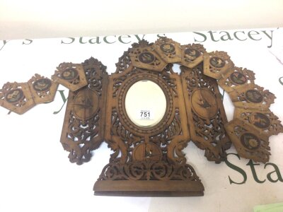 An Early 20th century Olive Wood triptych mirror inlaid with birds and a conforming fretwork decoration.  Hight 43cm