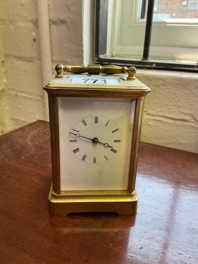 A brass cased 4 glass carriage clock, 4.8”. X 3.2” x 3”.