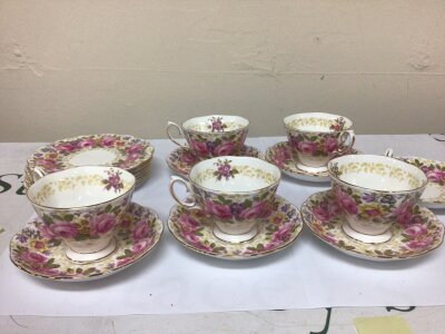 A Royal Albert English bone china tea set The Serena pattern with a perfusion of flowers five cups six saucers six side plates no obvious damage