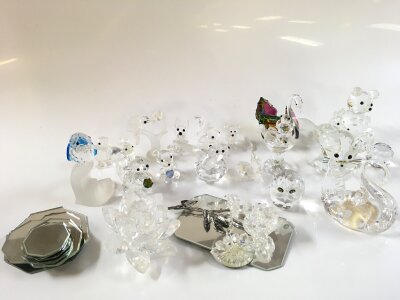 A Collection of Swarovski figures unboxed