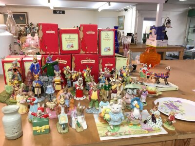 A large collection of Royal Doulton Bunnykins including Royal Doulton Bunnykins Arthurian Legends collection, dashing through the snow figure.