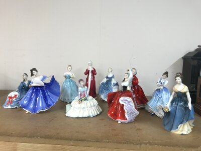 A collection of porcelain Royal Doulton figures including Elaine, Elyse, Enchantment, Hilary etc