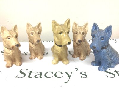 Five Vintage Sylvac dog ornaments. Including a blue dog maximum height 22cm one damaged