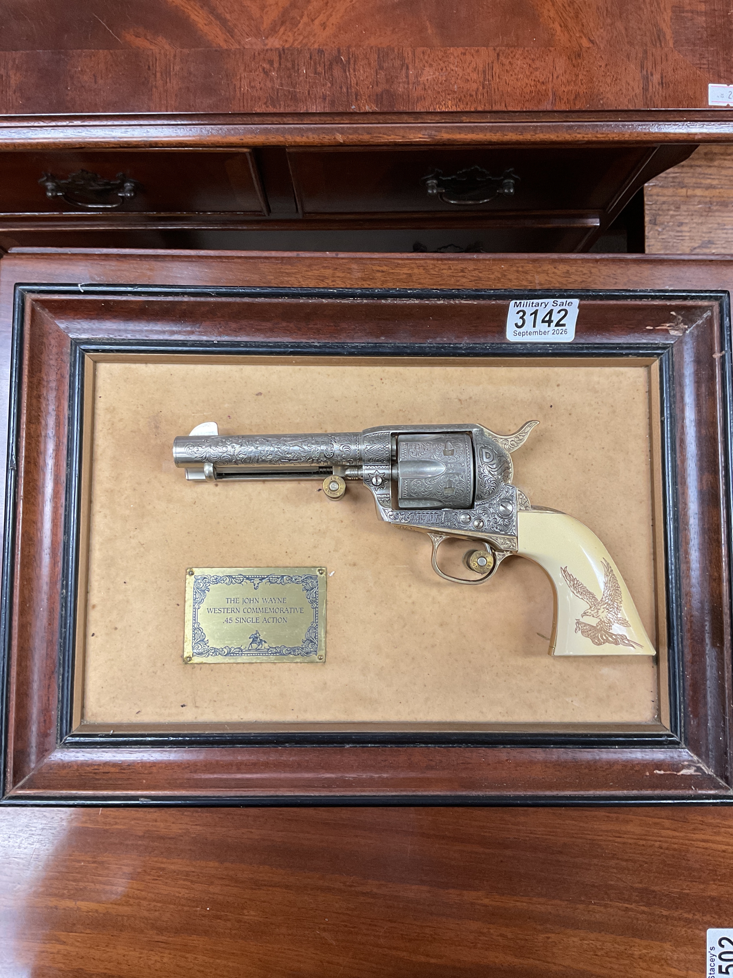 The John Wayne 45 Colt wall hanging 