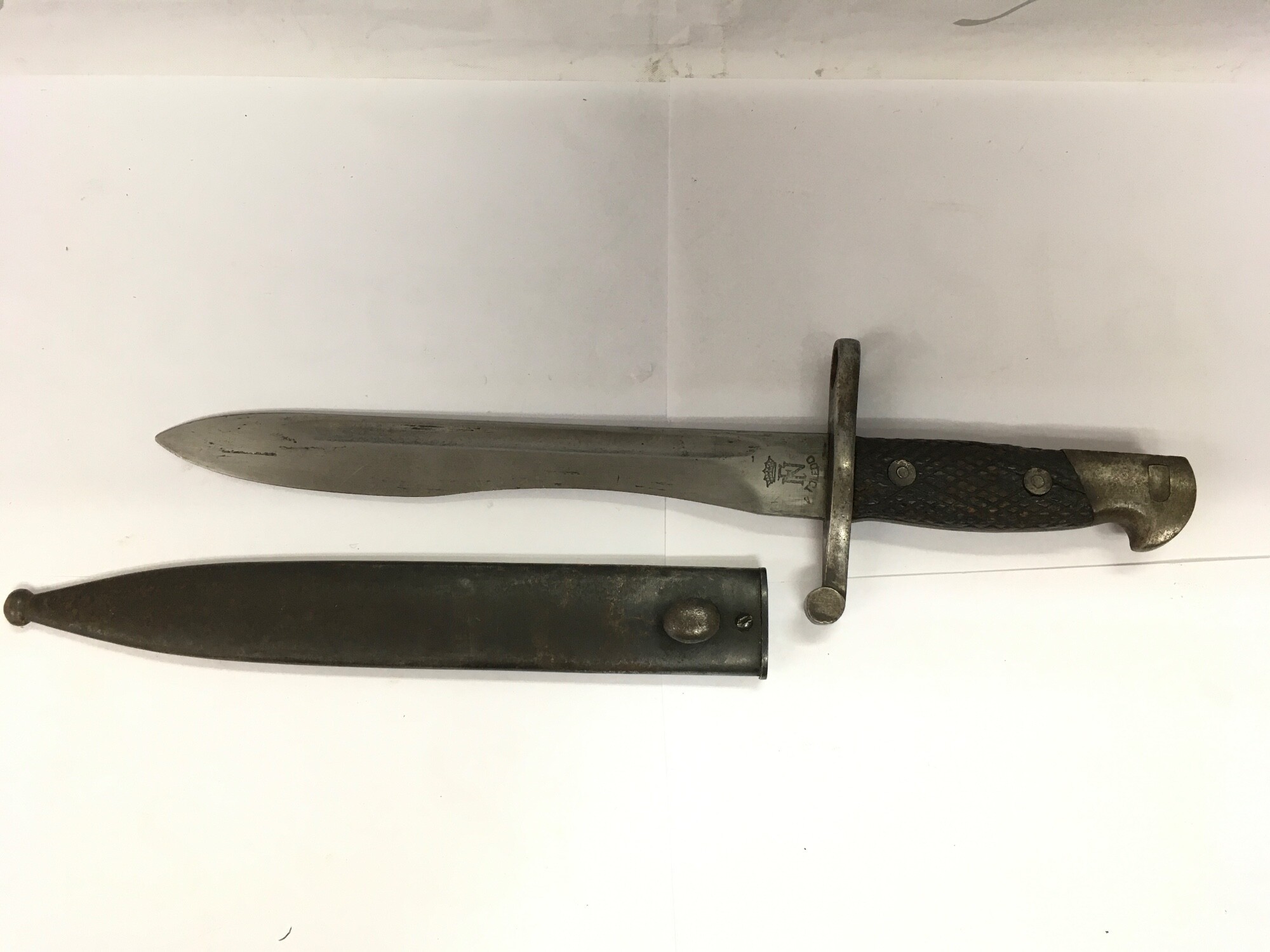 A Spanish Toledo bayonet and sheath.