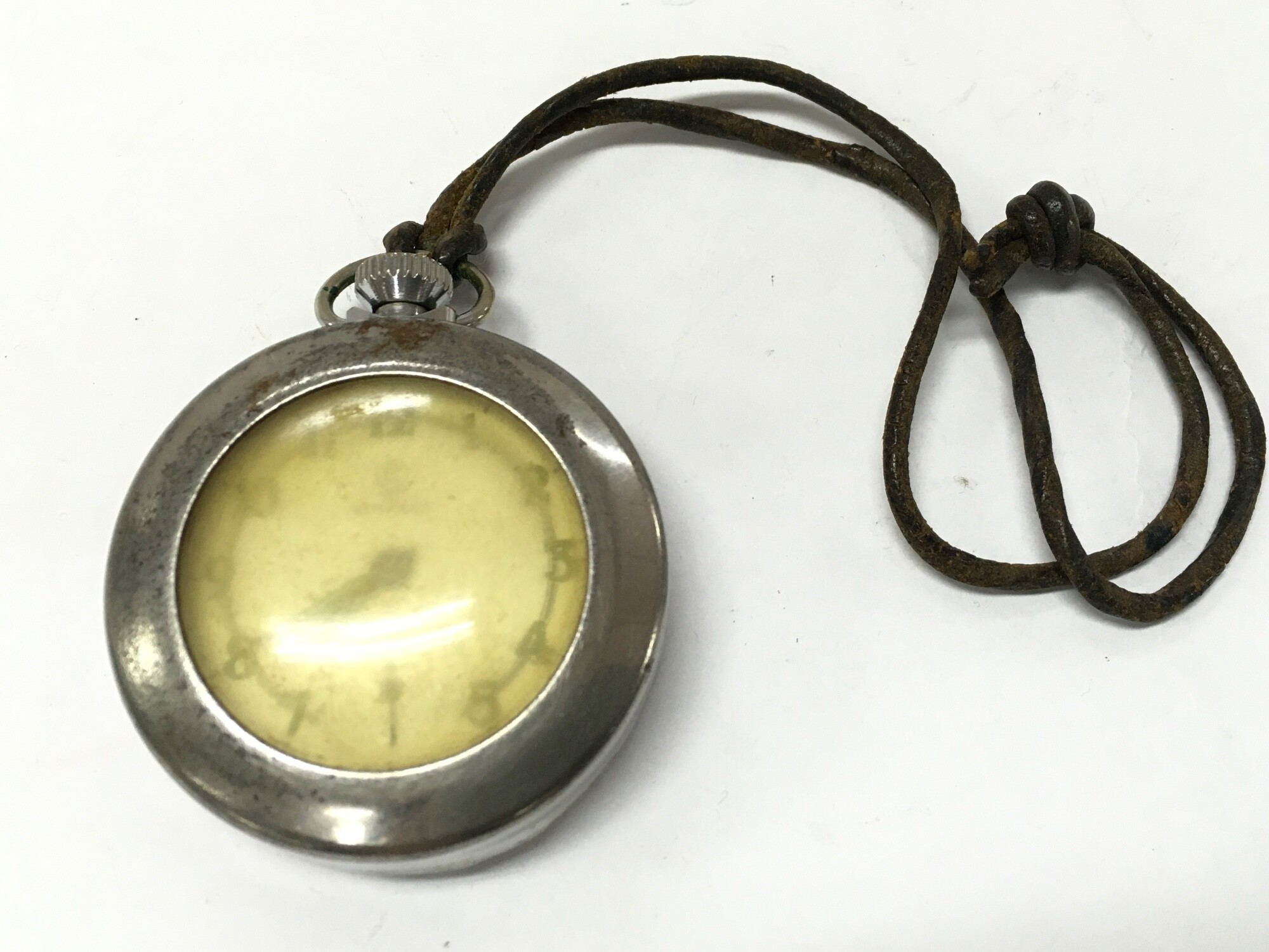 A 1940s Military issue Services pocket watch in a carry necklace case