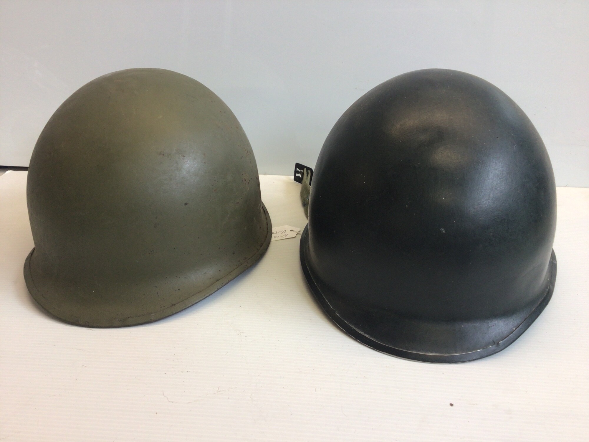 Two American Helmets from the Vietnam war Era.