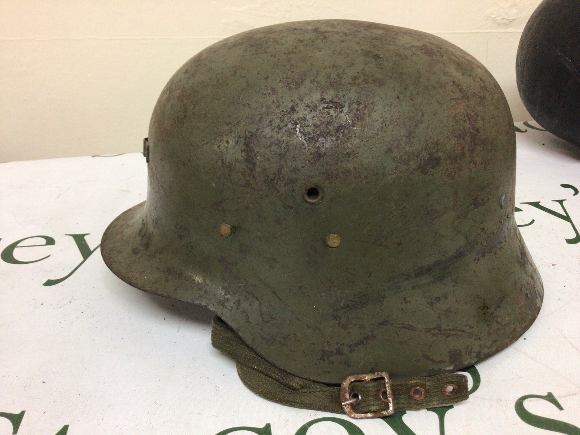 A II world war Spanish Military helmet with original lining nice original example.