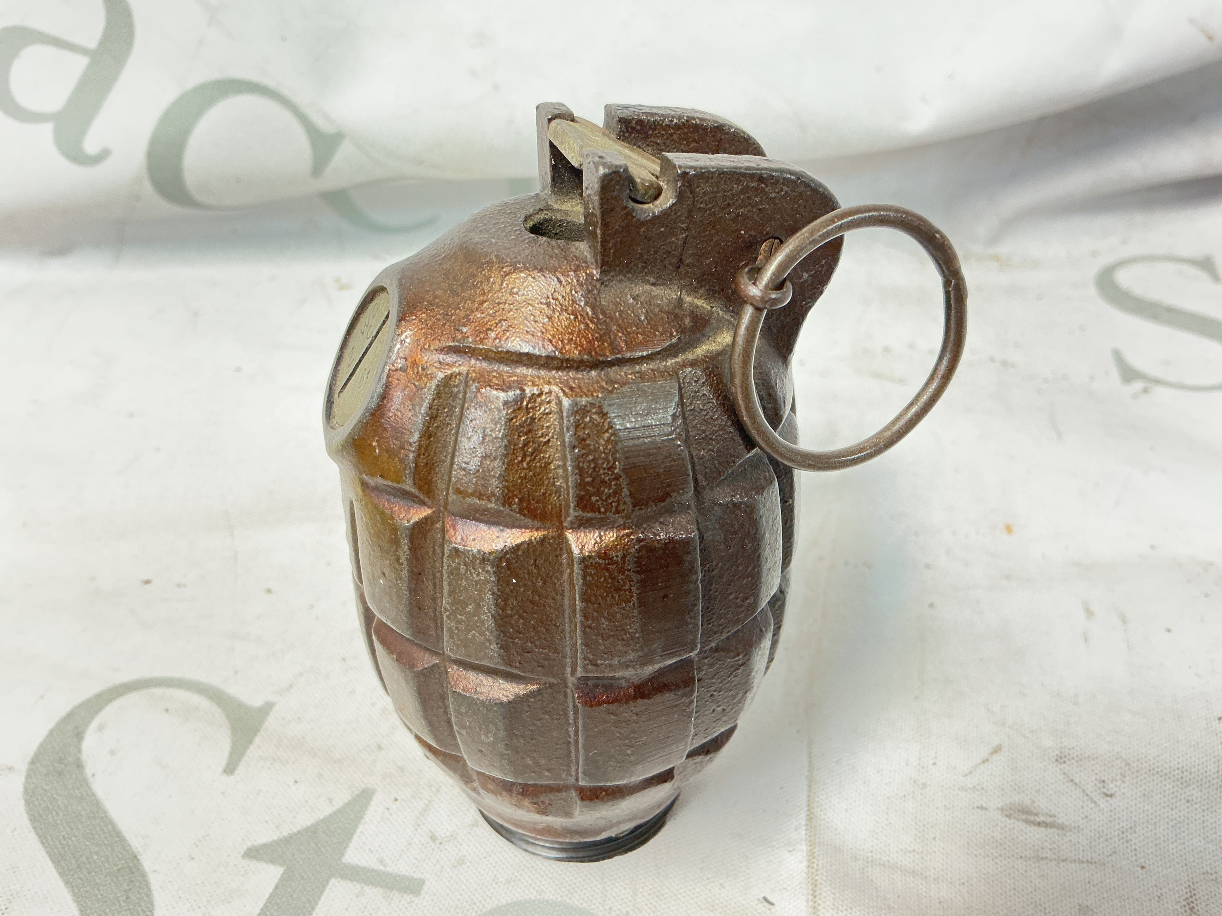 A WW2 Mills Hand Grenade.