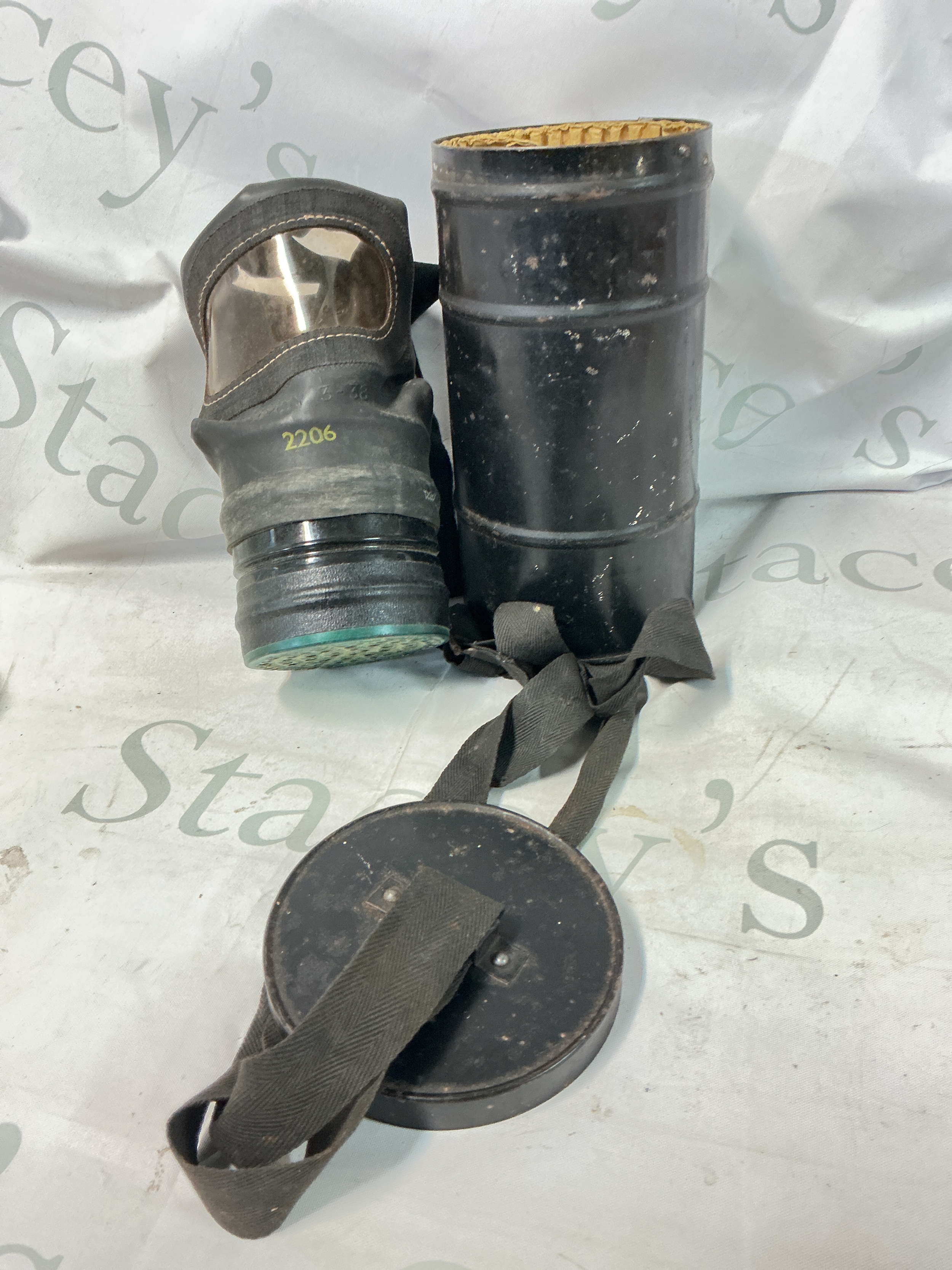 A British WW2 Civilian Gas Mask Complete With Its Tin.