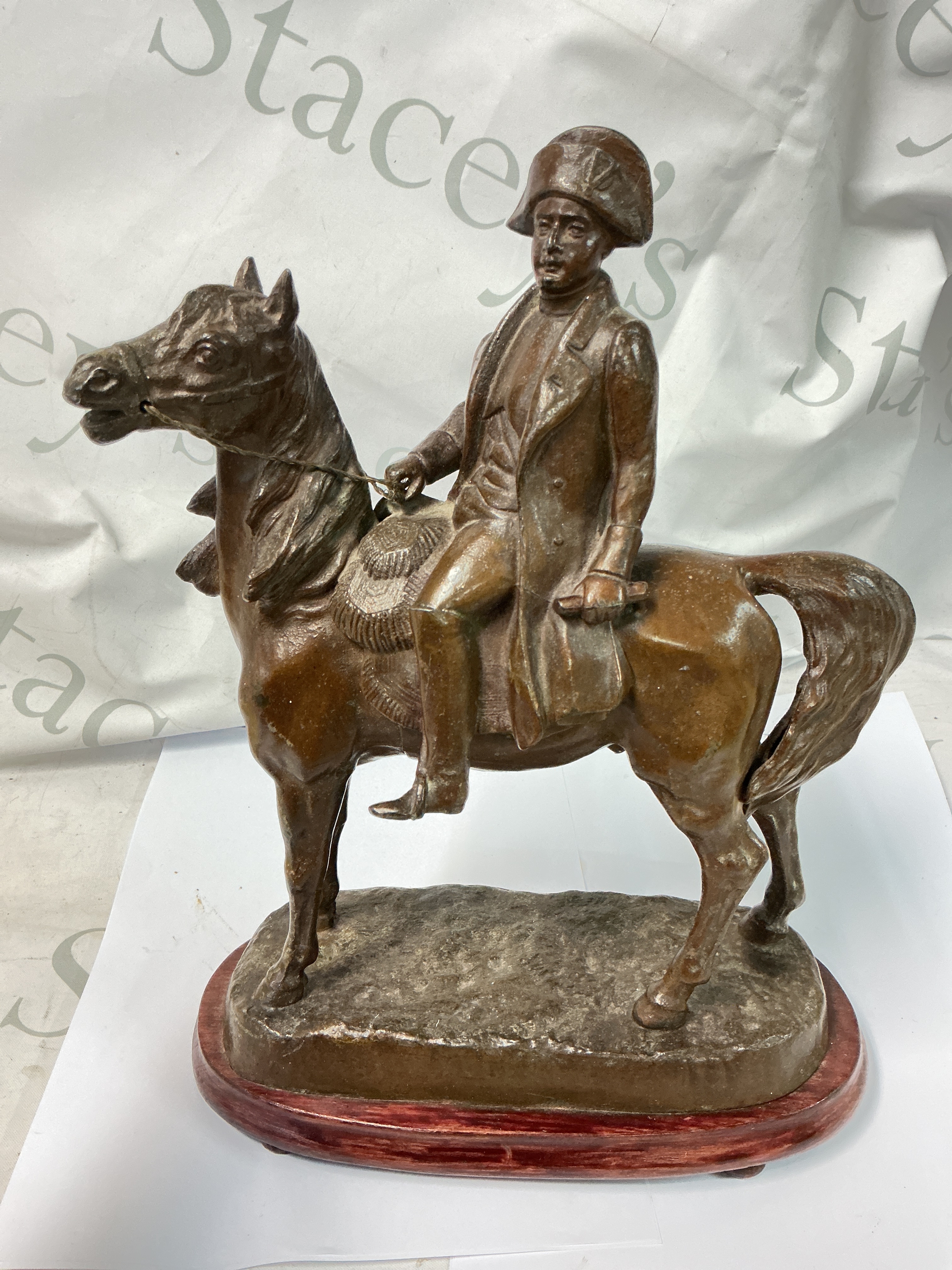 A bronzed Spelter Figure Of Napoleon On Horseback. Approx Height 32Cm And Length 24Cm.