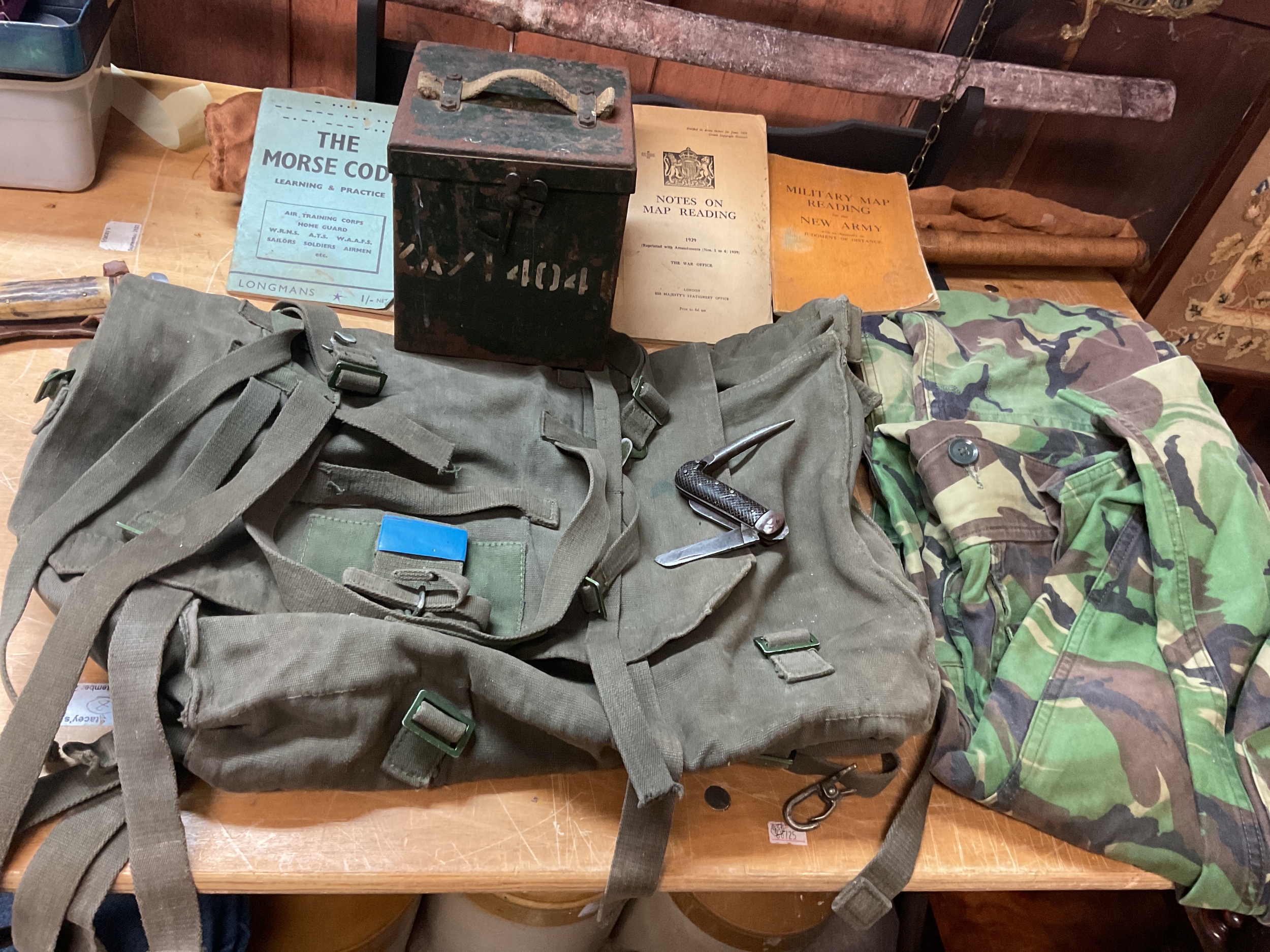 70s DPM trousers, backpack, wireless box, manuals and jackknife.