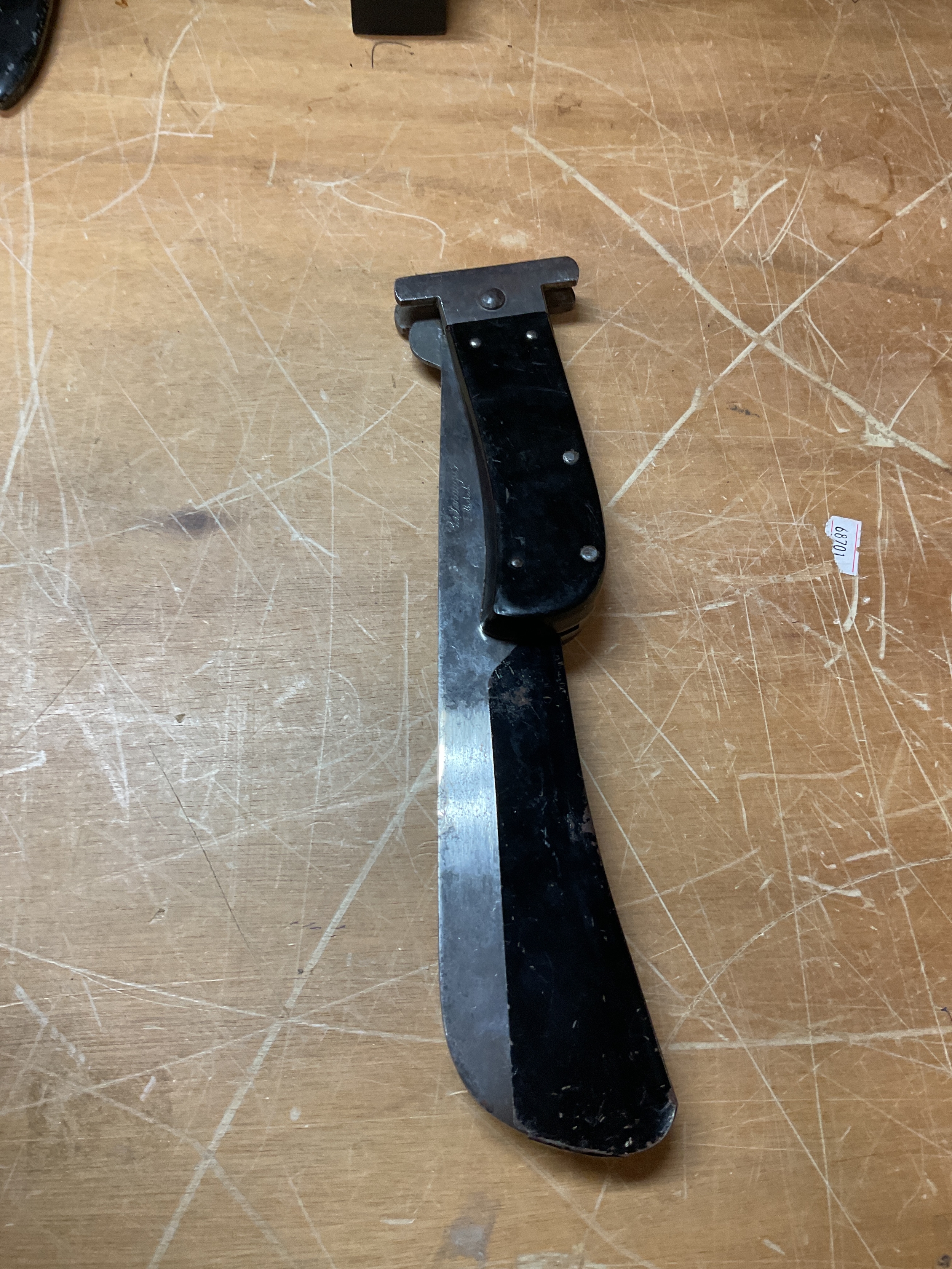 WWII USAF Emergency issue folding survival knife/machete, with blade guard. Marked Cattaraugus USA.