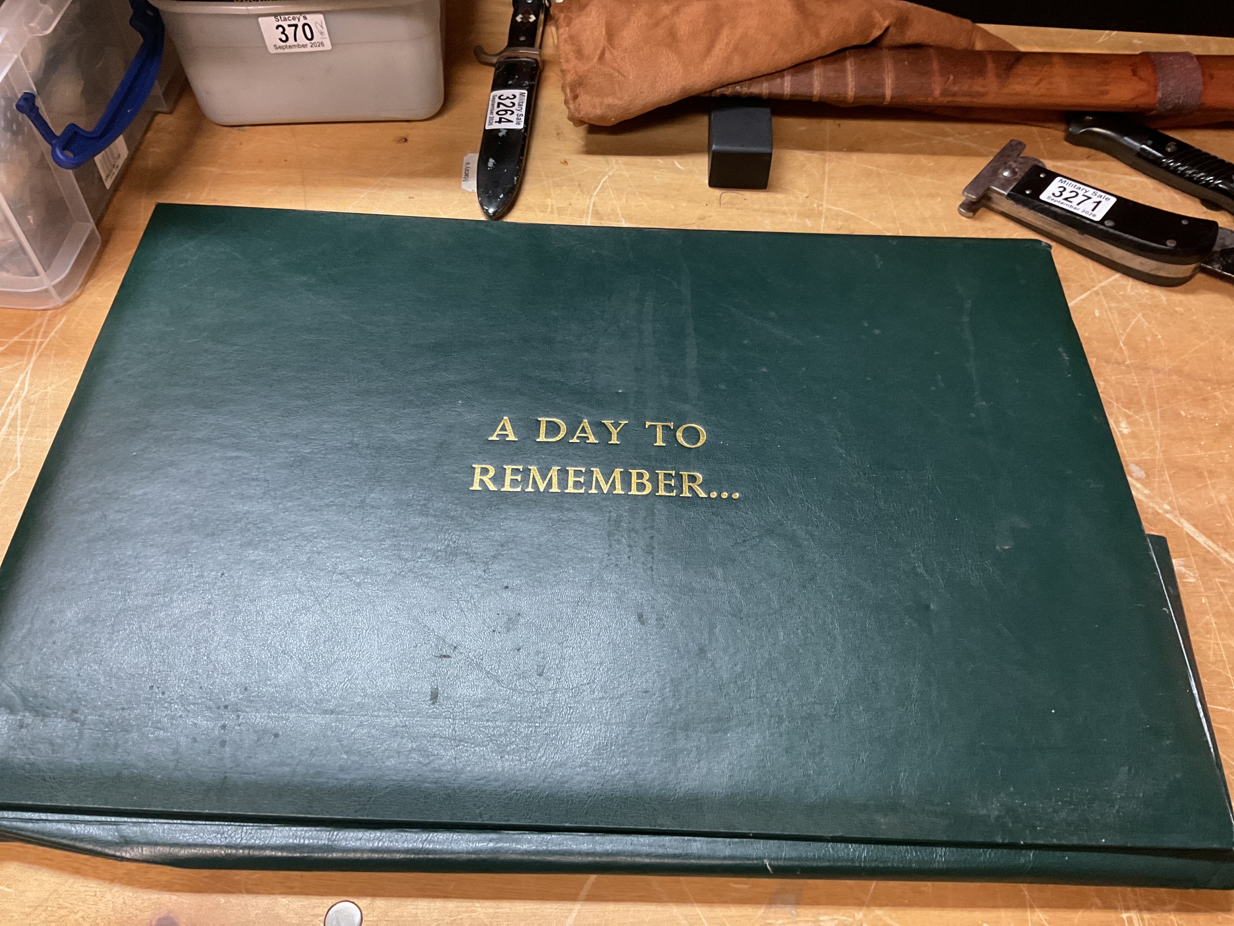 "A Day To Remember" folder of Military paraphernalia, photocopied plans and documents and an original copy of The Times from Feb 14 1942.
