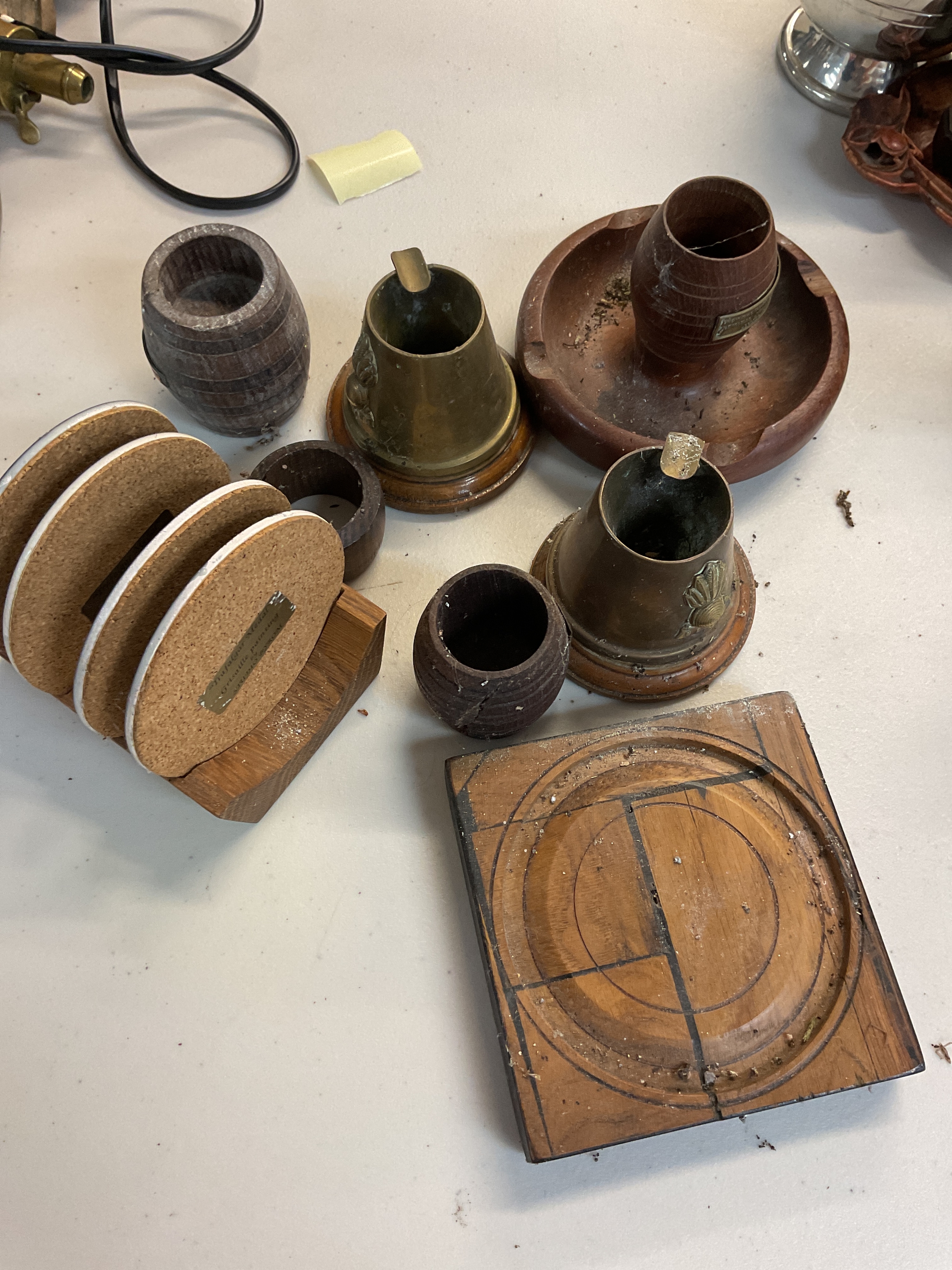 A collection of treen to include match strikes from HMS mystery, Ganges etc. 