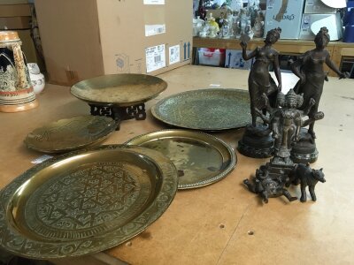 A Collection of metal ware including Eastern dishes, a pair of spelter Art Nouveau figures and Indian deities
