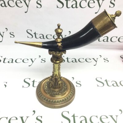 A heavy old horn snuff mull on gilt metal base. 37cm tall 38cm wide