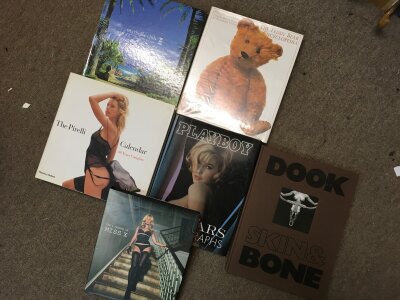 A collection of hardback books including The Pirelli Calender - 40 Years complete, Playboy-50 years and Marbella Club