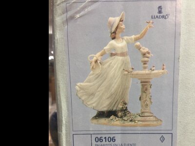 A Lladro figure spring joy fitted i. Original box .