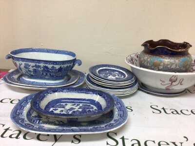 A collection of Victorian Willow pattern blue and white ceramics