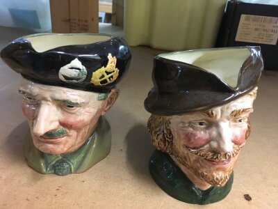 A collection of Toby jugs including Doulton various