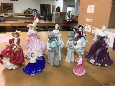 Nine ceramic figures including Royal Doulton -Flowers of Love, True Love, Diana, Christmas Day 2004 etc. Together with two boxed Buckingham Palace Diamond Jubilee 2012 commemorative mugs