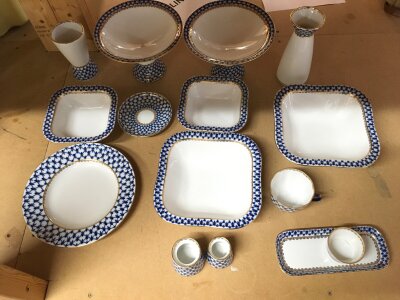 Lomonosov Imperial Russian St Petersburg Cobalt Net porcelain including vases, comports, dishes, cup and saucer, spice set with tray