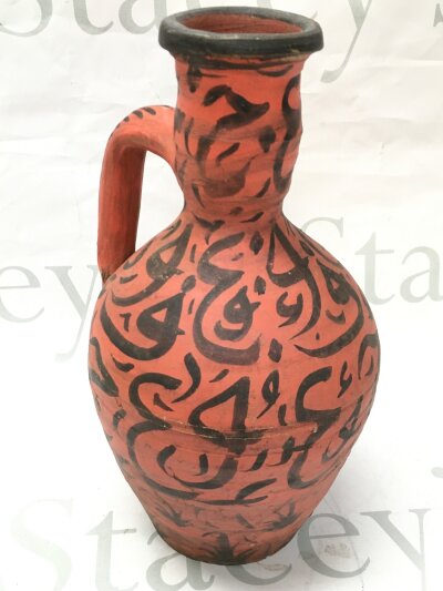 A Moroccan jug, 25cm tall
