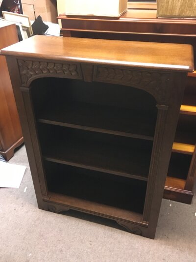 An oak bookcase with carved design 75cm wide, 98cm tall- NO RESERVE